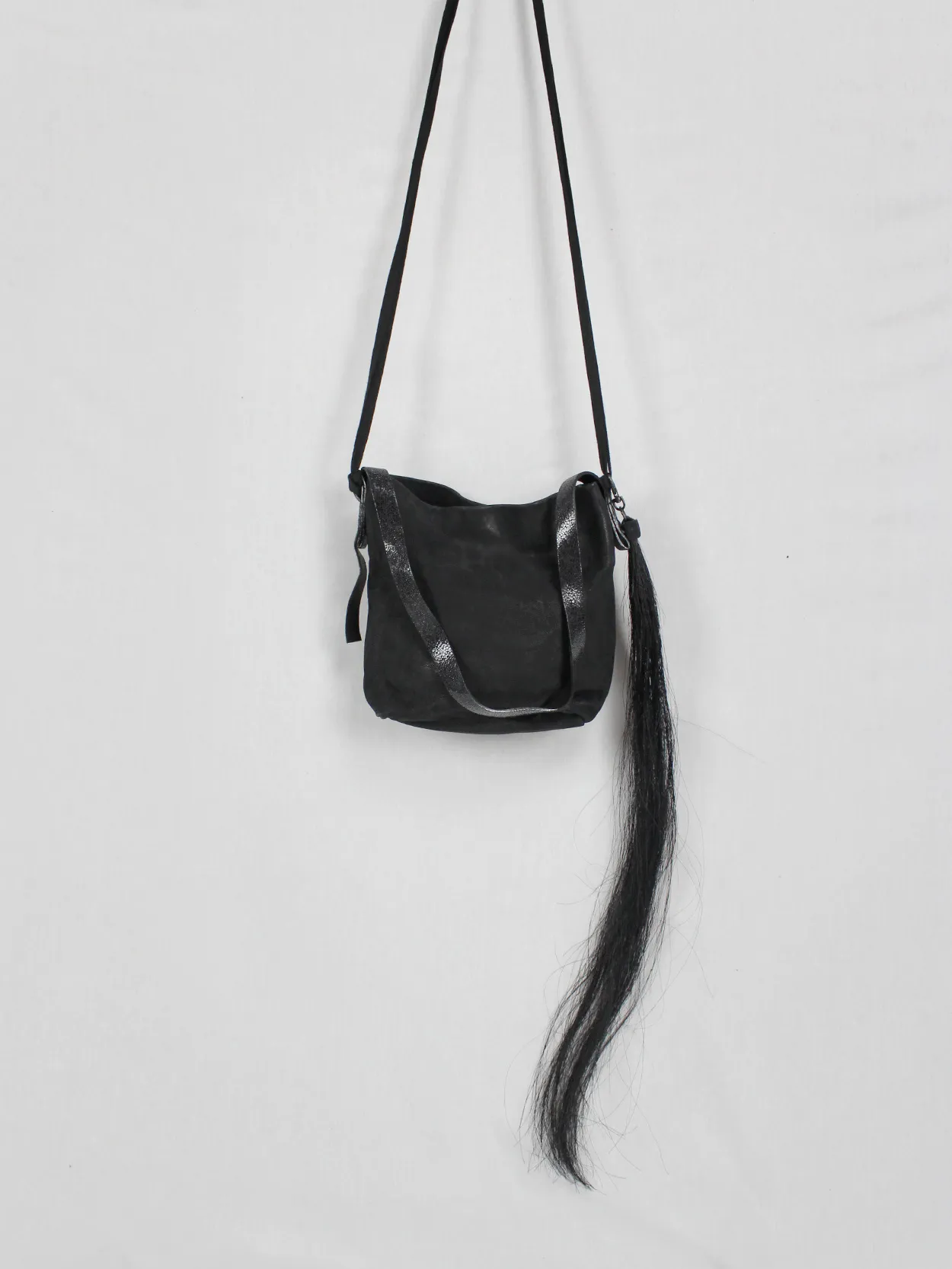 Ann Demeulemeester black leather shoulder bag with extra long horsehair tassel