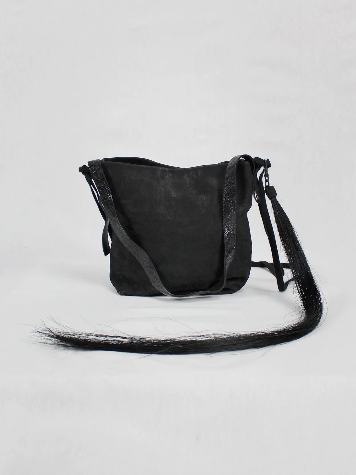 Ann Demeulemeester black leather shoulder bag with extra long horsehair tassel