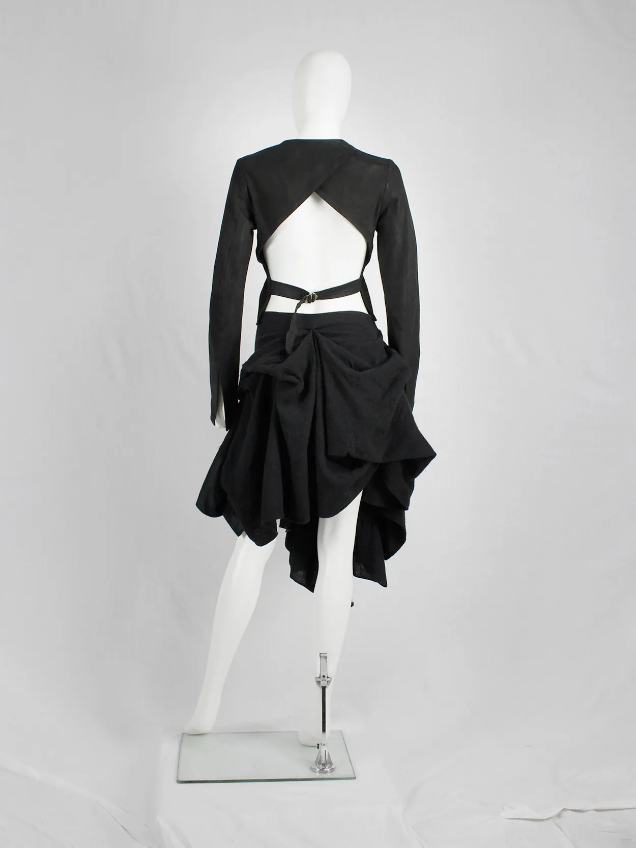 Isaac Sellam black leather jacket with open back and belt strap